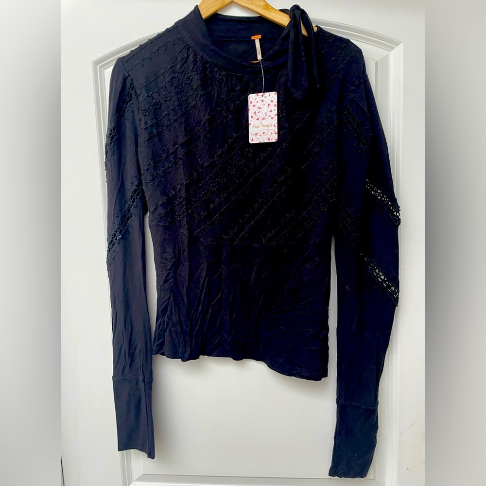 Free People long sleeve cotton top with tie neck and crochet details. NWT! Sz M